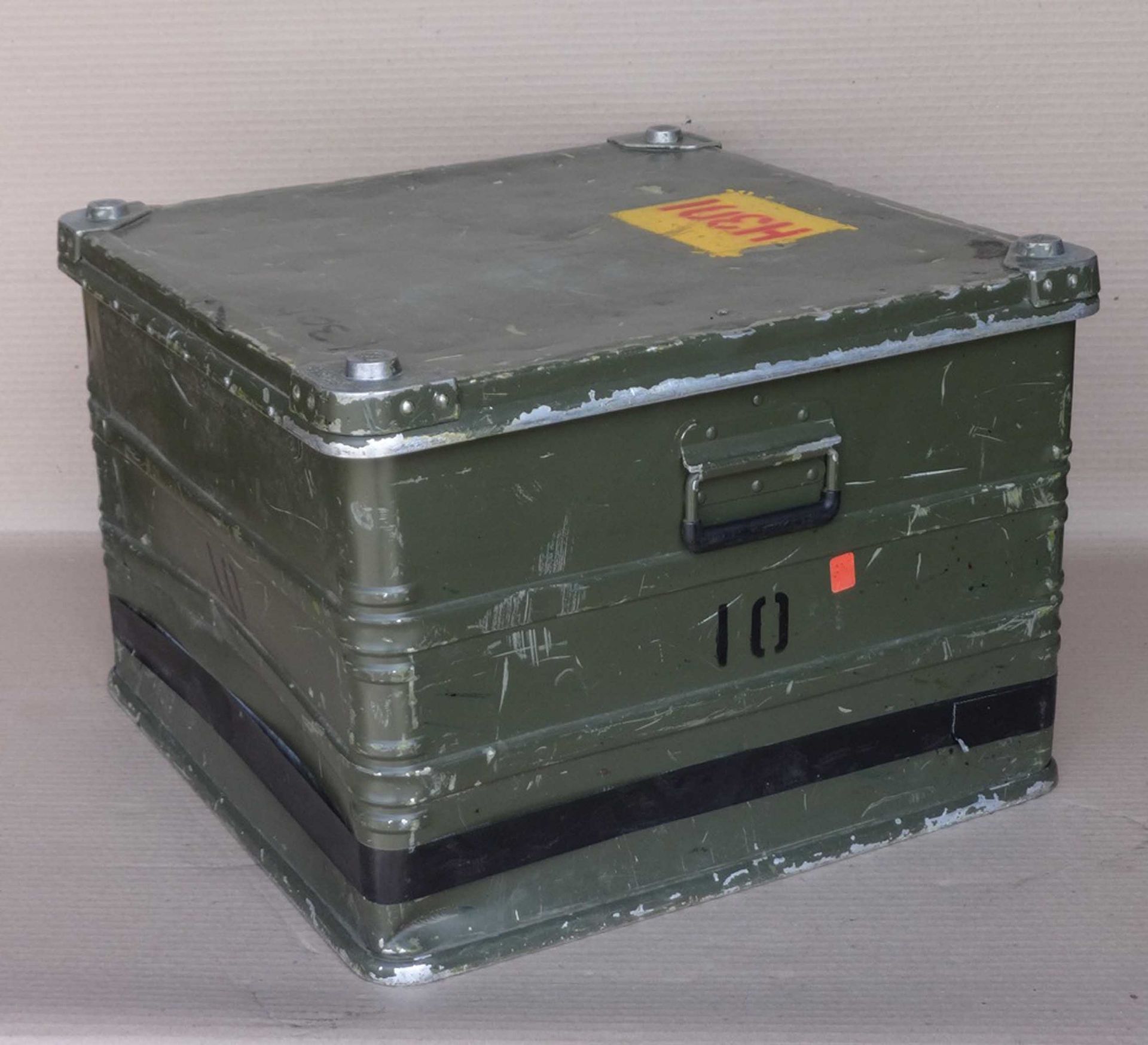 A set of four green military boxes, 40x58x58cm.