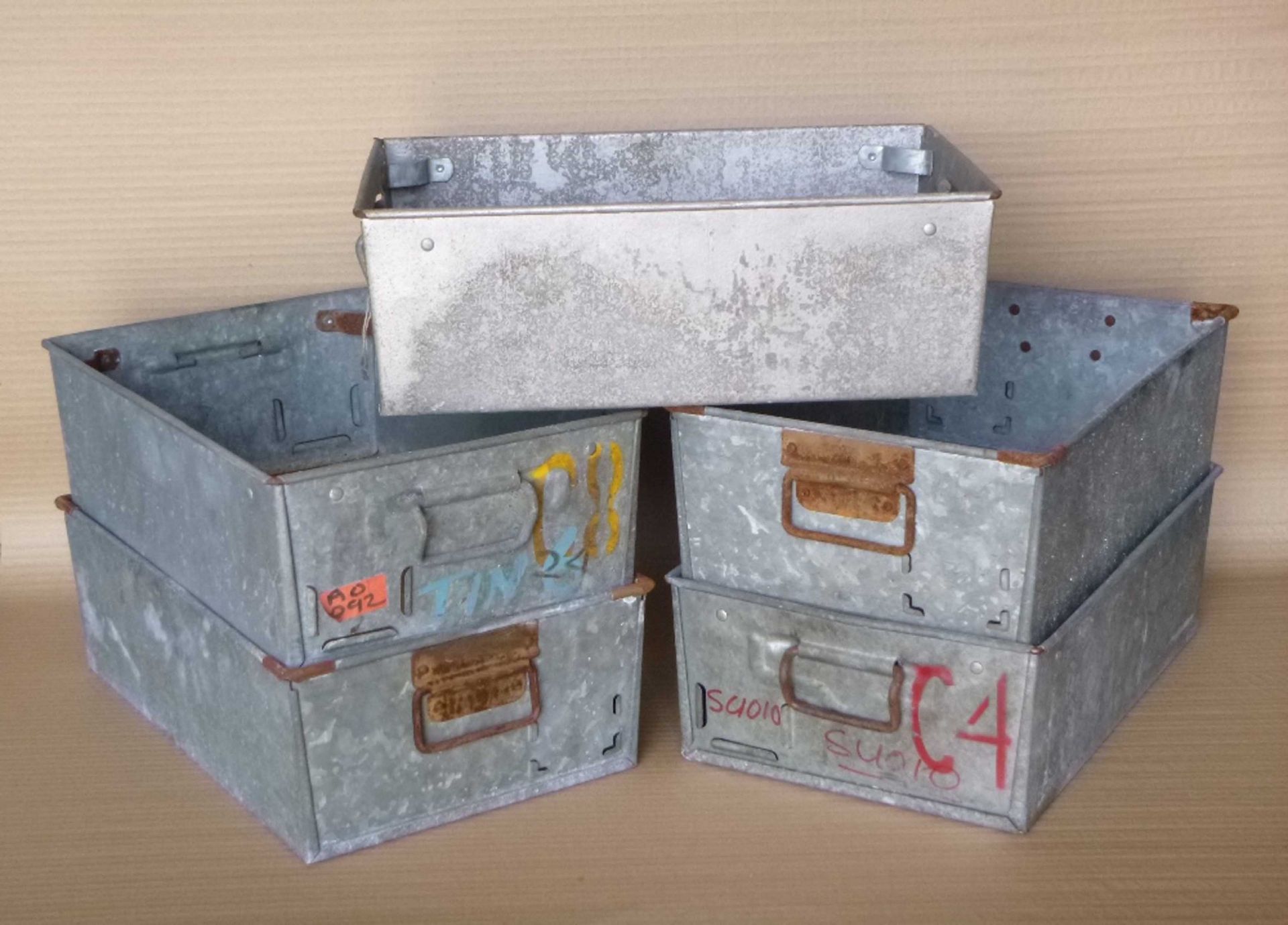 Set of twelve old metal tote tins, 16x46x31cm.