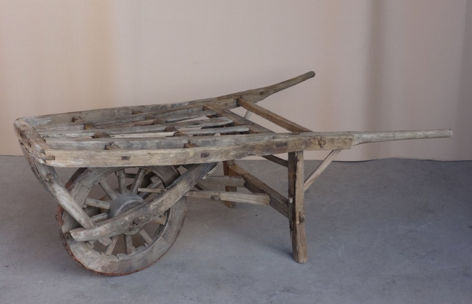 Flat wooden hand cart.