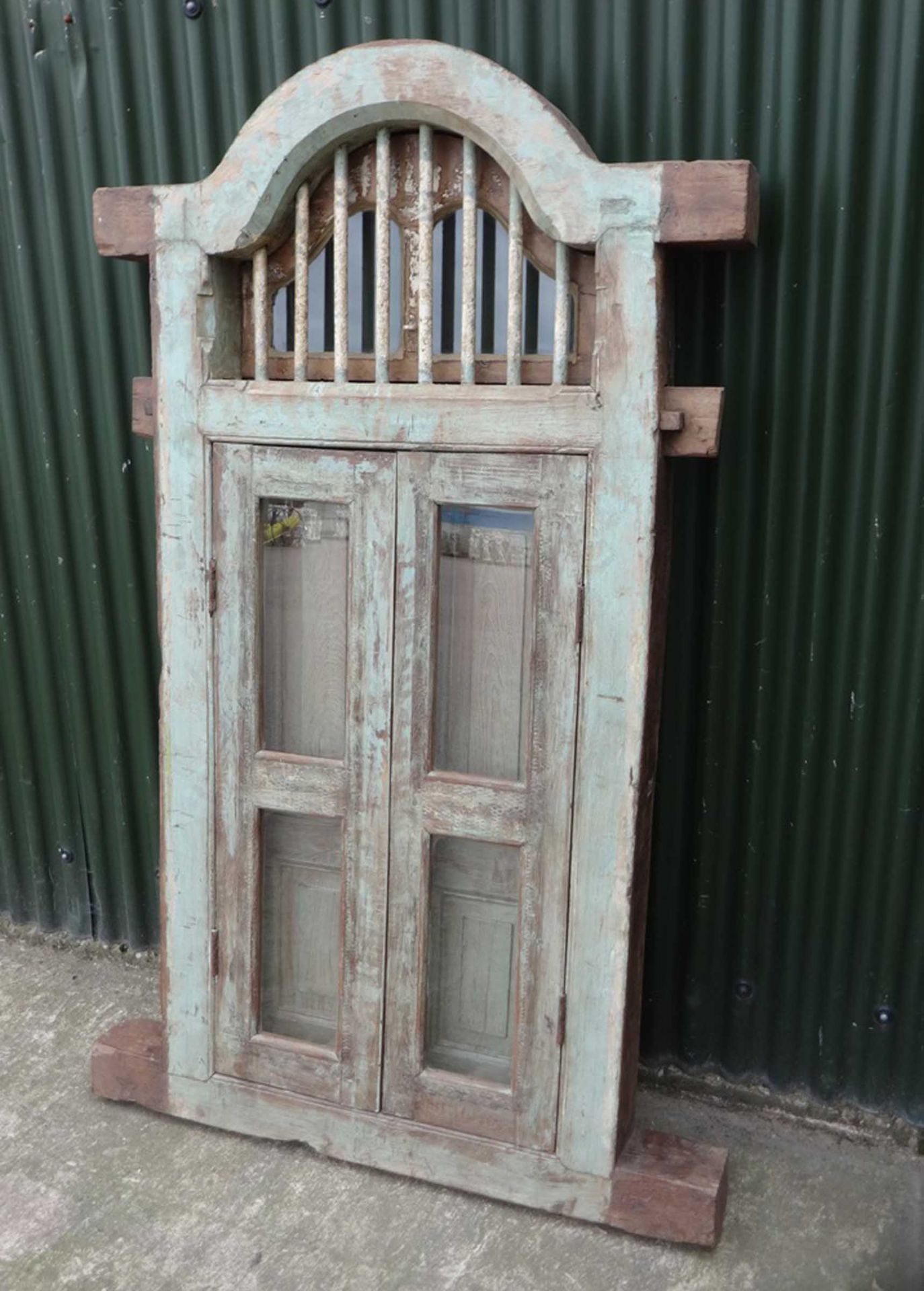 Glazed set of wooden window shutters.