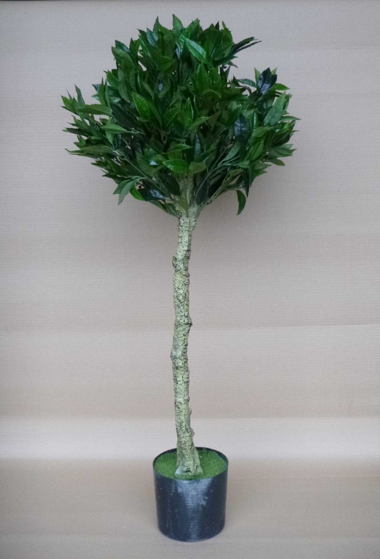 An artificial potted bay topiary tree, four foot high.