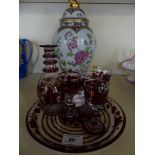 A 19th Century Continental clear and red glass set of decanter and four small spirit glasses with