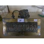 A brass lion head door knocker and a brass letter box (2)