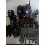 A collection of various West African carved hardwood busts and figures,