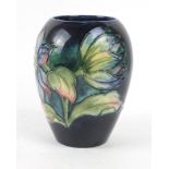 A Walter Moorcroft vase of ovoid form Decorated in the Clematis pattern on a blue ground,