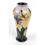 A Moorcroft pottery vase of tapering shouldered form Decorated in the Windrush pattern,