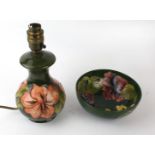 Two pieces of Moorcroft pottery decorated in the Hibiscus pattern Comprising baluster table lamp,