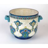 A large French Longwy twin handled jardiniere Decorated in enamel with groups of floral sprays to