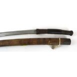 A Burmese Dha sword, late 19th/early 20th Century 57cm curved single edged single fullered blade,