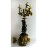 A gilt metal and bronze five light candelabra,