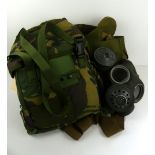 A collection of three gas masks,