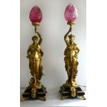 A pair of modern gilt metal figural table lamps Formed as classical maidens,