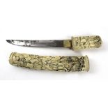 A fine quality ivory mounted Japanese Tanto, late 19th Century With 19.