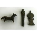 A bronze bull amulet,