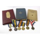 A collection of assorted World War I and World War II medals To include a medal pair awarded to