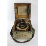 A wooden cased gimble mounted azimuth circle no 4 compass, WWII With War Department marks,