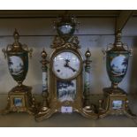 A modern Continental brass and porcelain three piece clock garniture