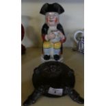 A 19th Century Staffordshire toby jug together with a further Oriental bronzed metal figural ashtray