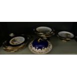 A Coalport part dessert service decorated with designs of various castles and views, together with a