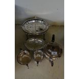 A mixed lot of silver-plated wares comprising a three piece tea service and two roll top serving