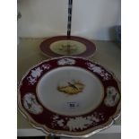 A Royal Doulton cabinet plate decorated with an exotic bird together with a further 19th Century