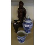 A mixed lot comprising a Chinese carved root wood figure, together with a further small blue and