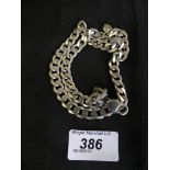 A silver chain, the flat curb link chain with a spring clasp, length 51.5cm, weight approx 2.3oz