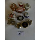 A selection of pill boxes of varying designs, to include a heart shaped box and a toolbox (11)