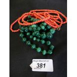 A malachite bead necklace together with a red bead necklace (2)