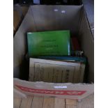 A box containing vintage books, newspapers to include cricketing interest and others