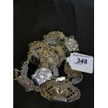 A 1920s silver belt, the foliate openwork panels with bar spacers, Birmingham 1924, weight approx