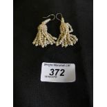 A pair of Victorian split pearl tassel earrings, the graduated split pearl earrings with a split