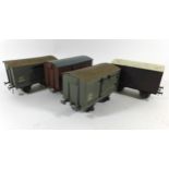 Four good quality 'O' gauge closed wagons In LMS livery believed to be by Bassett-Lowke Four good