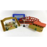 A quantity of Hornby Dublo accessories Comprising boxed D1 footbridge, an unboxed signal box,