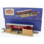 A boxed Hornby Dublo T.P.O mail van set In blue and white striped picture card box A boxed Hornby