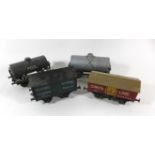 Four good quality unboxed 'O' gauge tankers/covered wagons The covered wagons advertising Dowlow