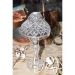 An early 20th Century cut glass mushroom shaped table lamp Having a lattice work cut glass domed