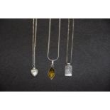 Three necklaces To include an amber pendant on chain, together with two others, stamped 925, total
