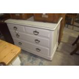 A painted Victorian chest of drawers The rectangular top with rounded front corners above an