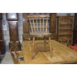 A set of six early 20th Century beechwood kitchen chairs Each chair with a stick back above a