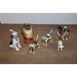 A mixed group of ceramic figures To include three Beswick hounds (height 7cm), a Beswick