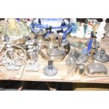 A mixed group of metal wares to include two hot water pots, teapot, pedestal dish, various spoons,