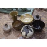 A mixed collection of various Studio pottery items To include a Linnier design bottle vase, an olive