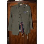 A Royal Marines dress uniform 20th Century Comprising jacket and trousers, size 28.