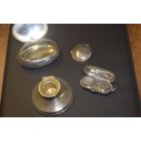 A hallmarked silver oval hinged box Along with a weighted silver Capstan ink well, and an oval