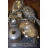 A collection of silver and white metal items To include a glass dressing table tray within a