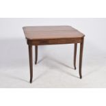 An early 19th Century mahogany folding tea table The rectangular folding top with rounded front