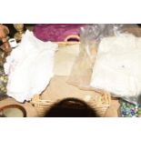 A quantity of cotton and lace table linen To include various embroidered floral design table