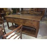 An 18th Century style pot board oak dresser, 20th Century Having a rectangular moulded top above