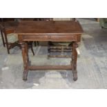 A Victorian walnut side table The rectangular moulded and quarter veneered top supported on four